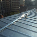 Toiture après travaux avec une Couverture en Zinc Naturel Toiture en zinc